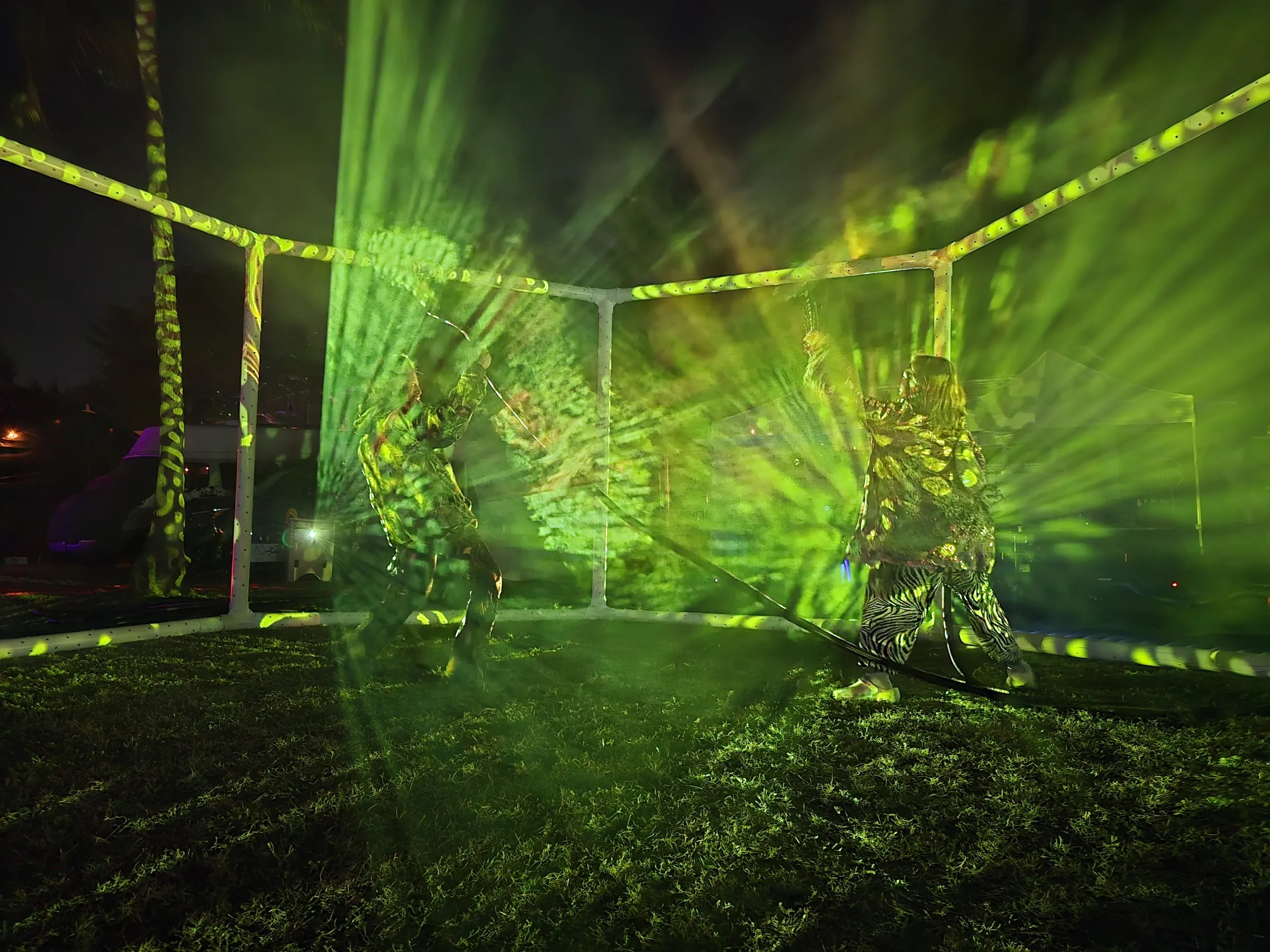 Green beams intersecting inside The Octagon's shared fog volume